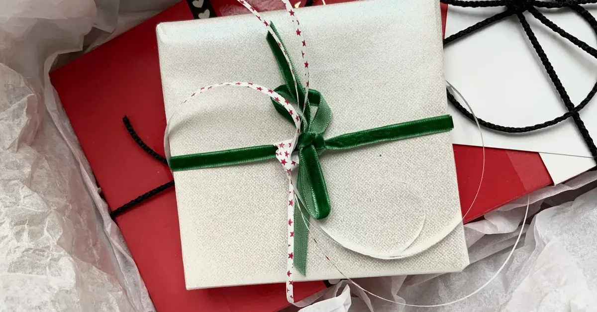 Beautifully wrapped gift boxes with ribbons and bows, perfect for festive occasions.